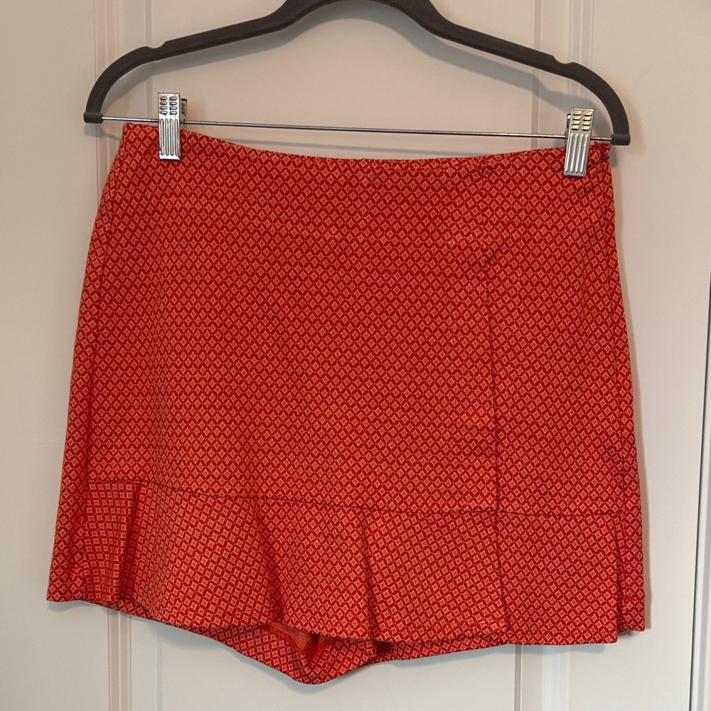 CAbi Vibrant Red and Orange Patterned Skort
